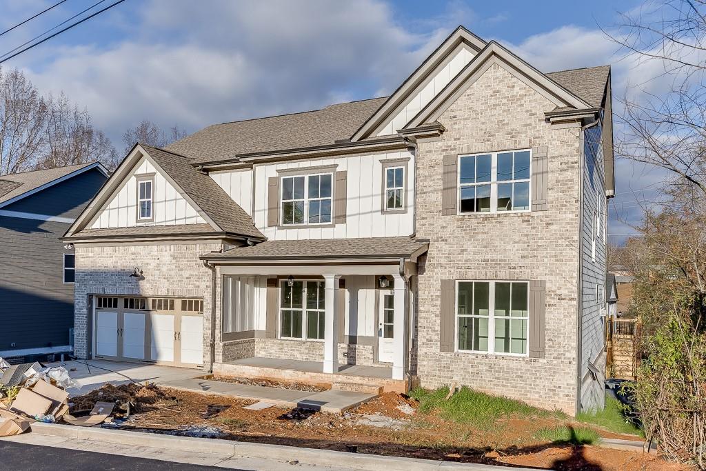 173 Swimming Pool Road Buford, GA 30518 - Photo 2 of 35 a front view of a house with a yard