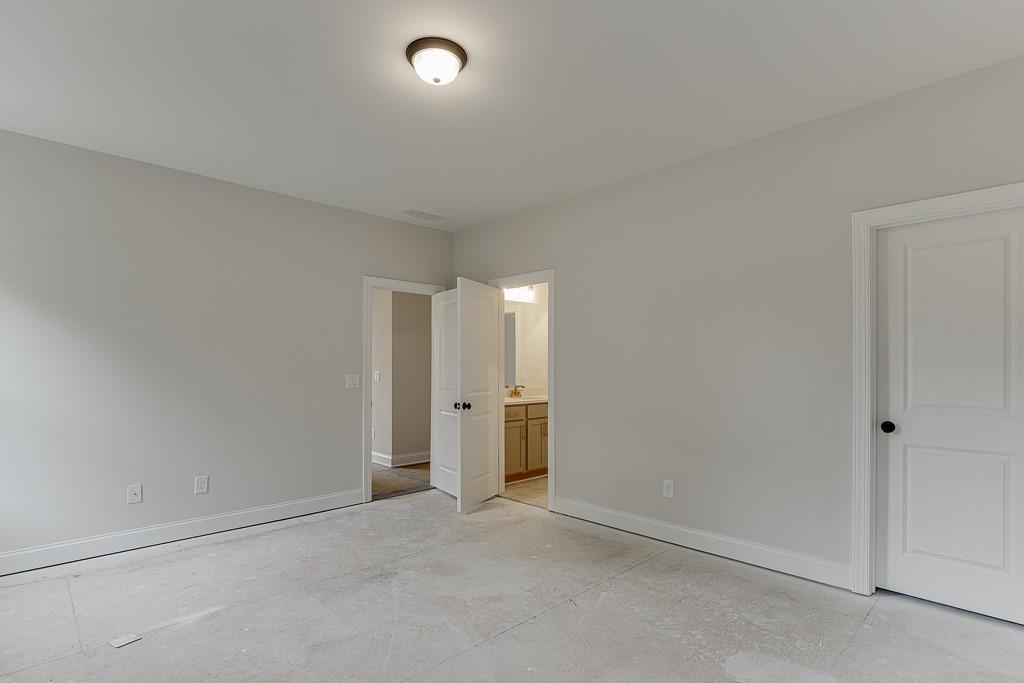 173 Swimming Pool Road Buford, GA 30518 - Photo 23 of 35 an empty room with an entryway