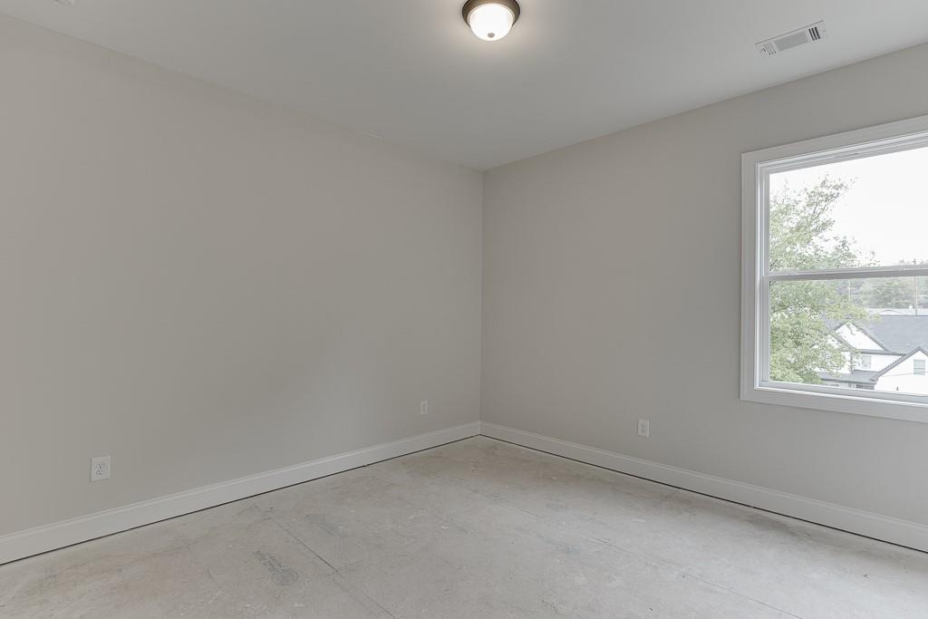 173 Swimming Pool Road Buford, GA 30518 - Photo 25 of 35 a room that has a window