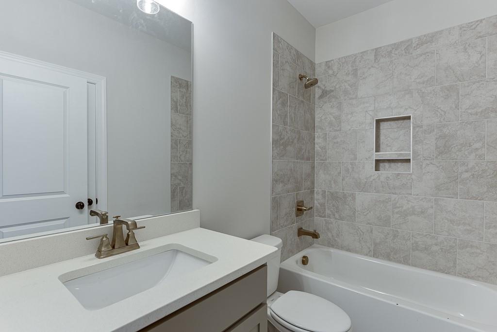 173 Swimming Pool Road Buford, GA 30518 - Photo 27 of 35 a bathroom with a sink toilet tub and shower