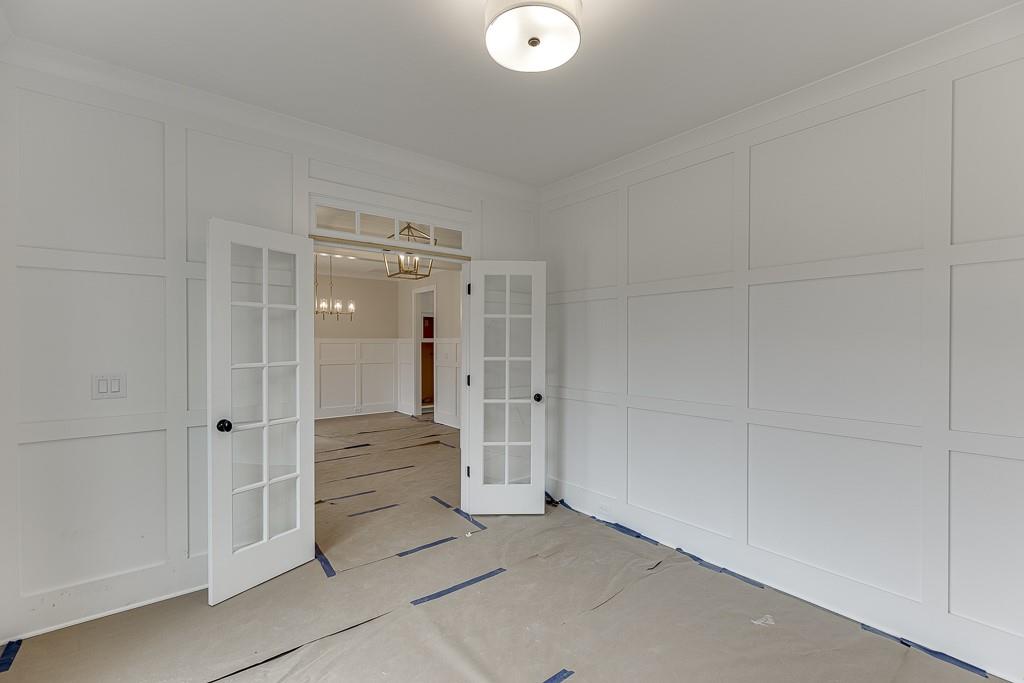 173 Swimming Pool Road Buford, GA 30518 - Photo 8 of 35 a bathroom with a shower and a glass door