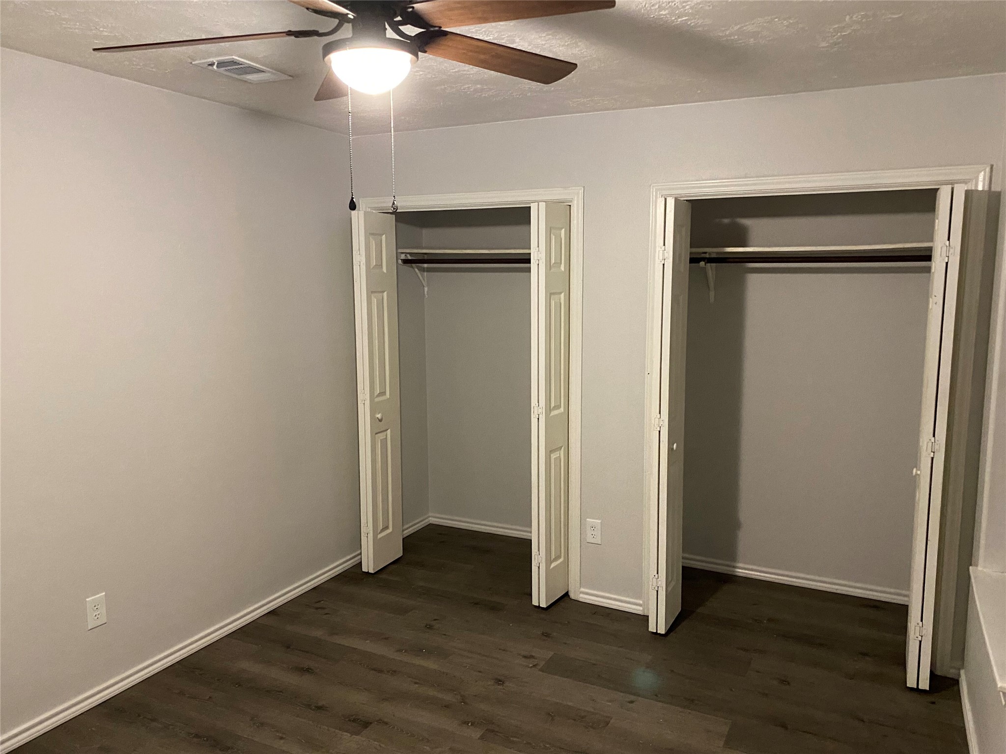 309 South Ave C, Unit A Elgin, TX 78621 - Photo 8 of 15 a view of an empty room with wooden floor