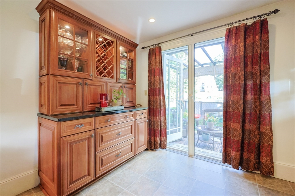 403 Main Street Clinton, MA 01510 - Photo 18 of 42 a kitchen with stainless steel appliances granite countertop a refrigerator and a sink