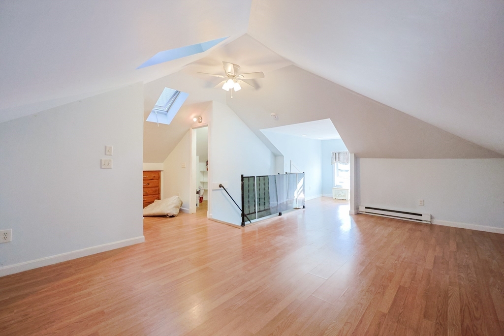 403 Main Street Clinton, MA 01510 - Photo 34 of 42 a view of an empty room with wooden floor
