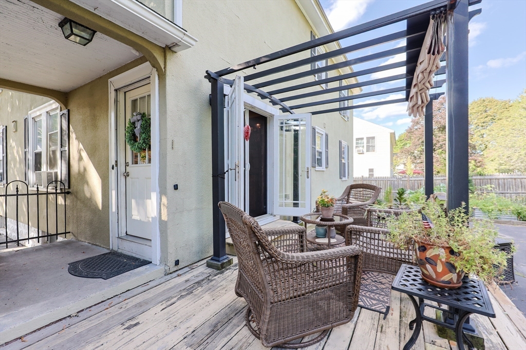 403 Main Street Clinton, MA 01510 - Photo 36 of 42 a living room with furniture and wooden floor