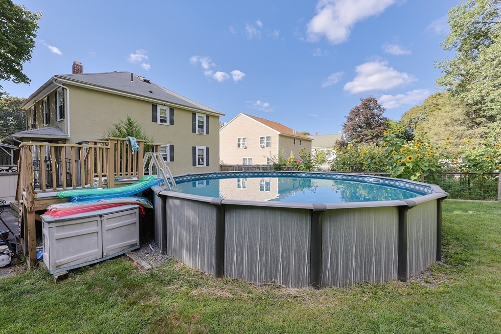 403 Main Street Clinton, MA 01510 - Photo 38 of 42 a house view with a sink outdoor seating and garden