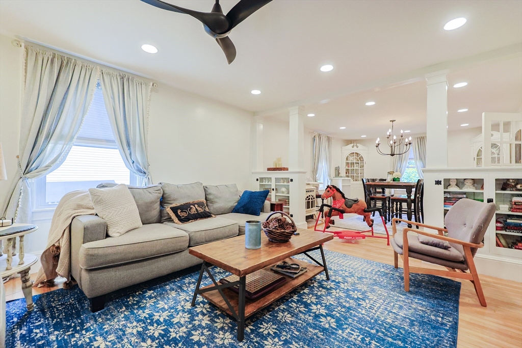 403 Main Street Clinton, MA 01510 - Photo 8 of 42 a living room with furniture and a rug