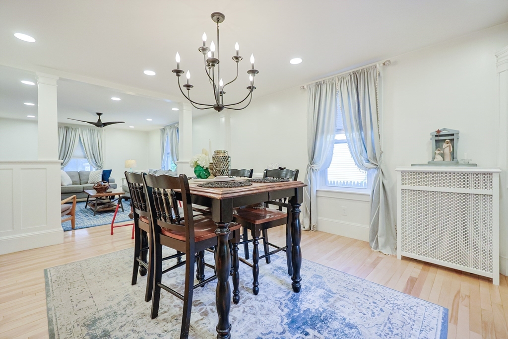 403 Main Street Clinton, MA 01510 - Photo 10 of 42 a view of a dining room with furniture and wooden floor