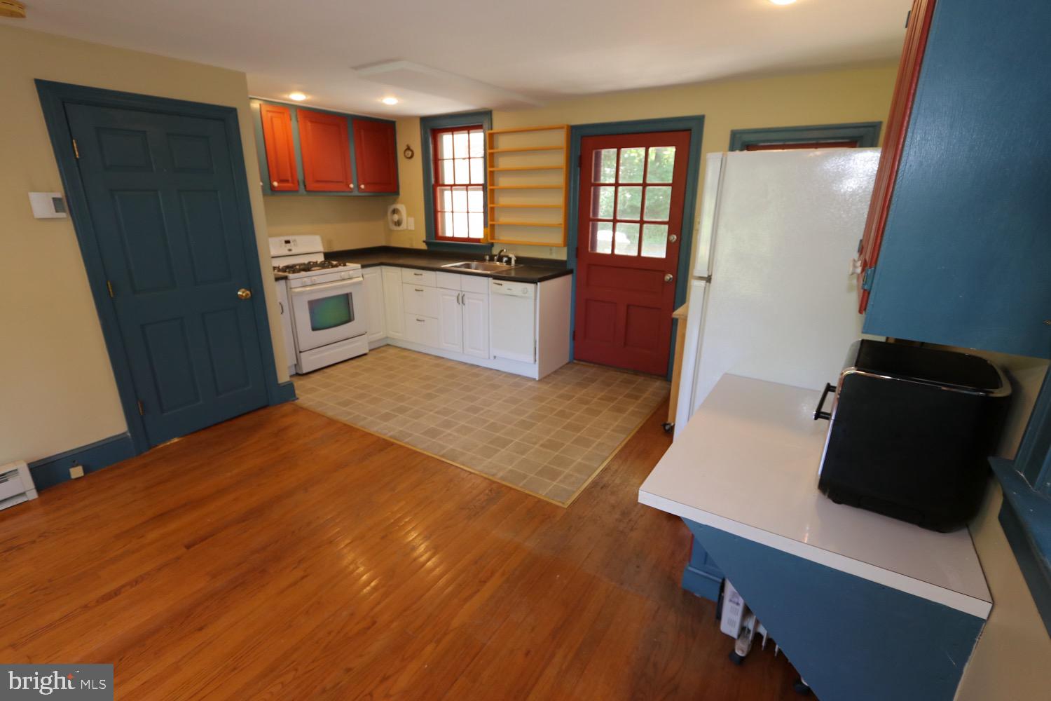2701 Alden Road Bryn Athyn, PA 19006 - Photo 84 of 105 a kitchen with stainless steel appliances granite countertop a refrigerator a stove top oven a sink and dishwasher