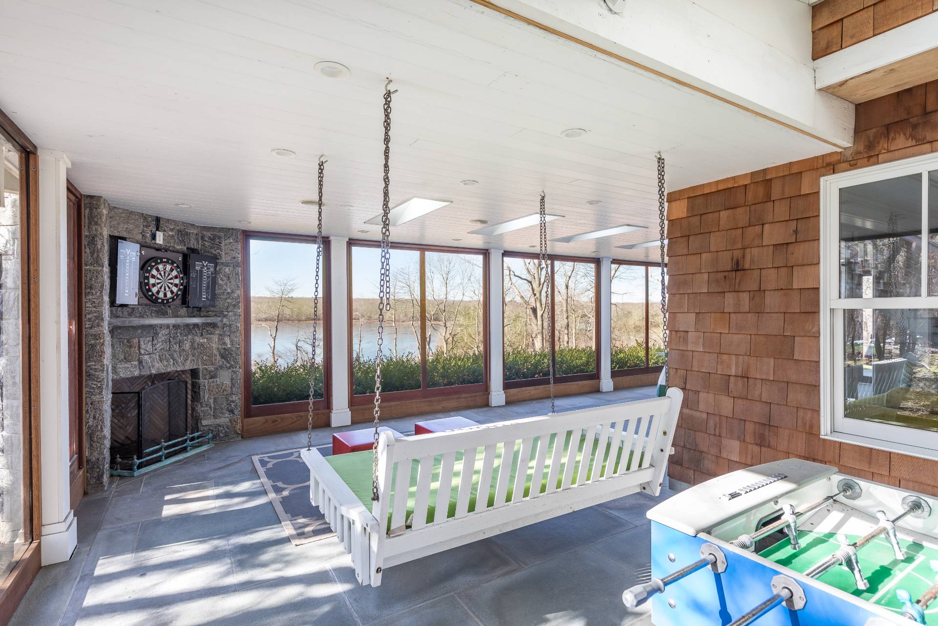 1333 Sagg Road Sag Harbor, NY 11963 - Photo 15 of 29 a bedroom with furniture and a fireplace