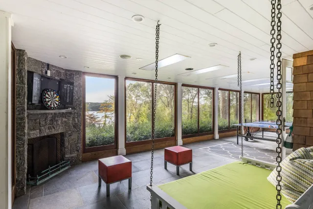 a spacious bedroom with a large bed and a large window