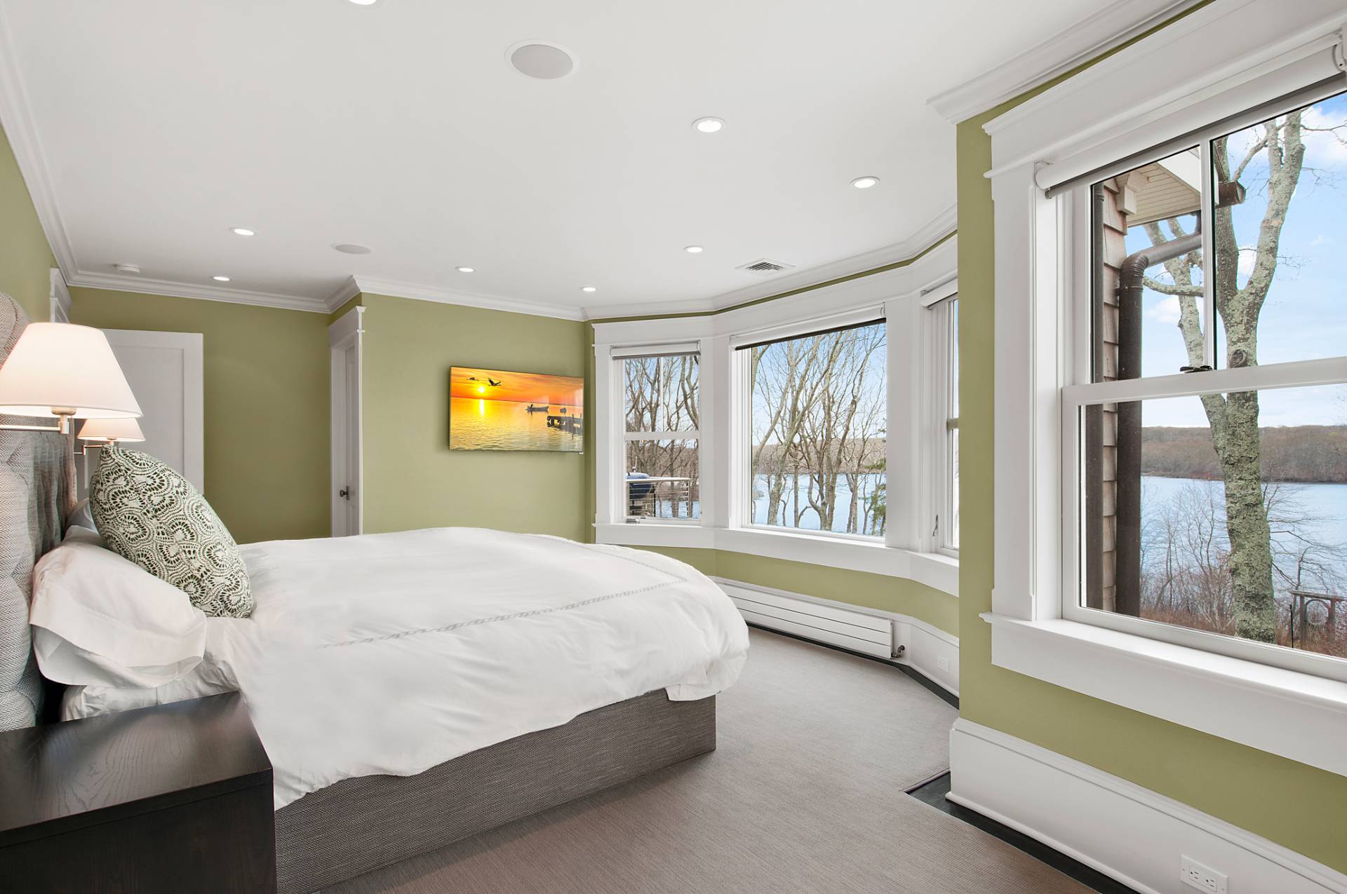 1333 Sagg Road Sag Harbor, NY 11963 - Photo 18 of 29 a spacious bedroom with a large bed and a large window