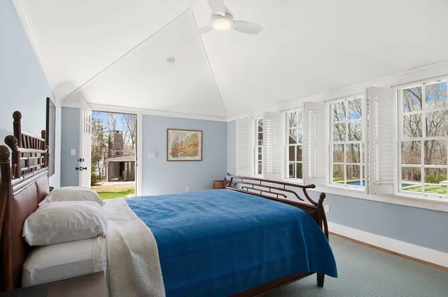 a bathroom with a sink a mirror and a bathtub