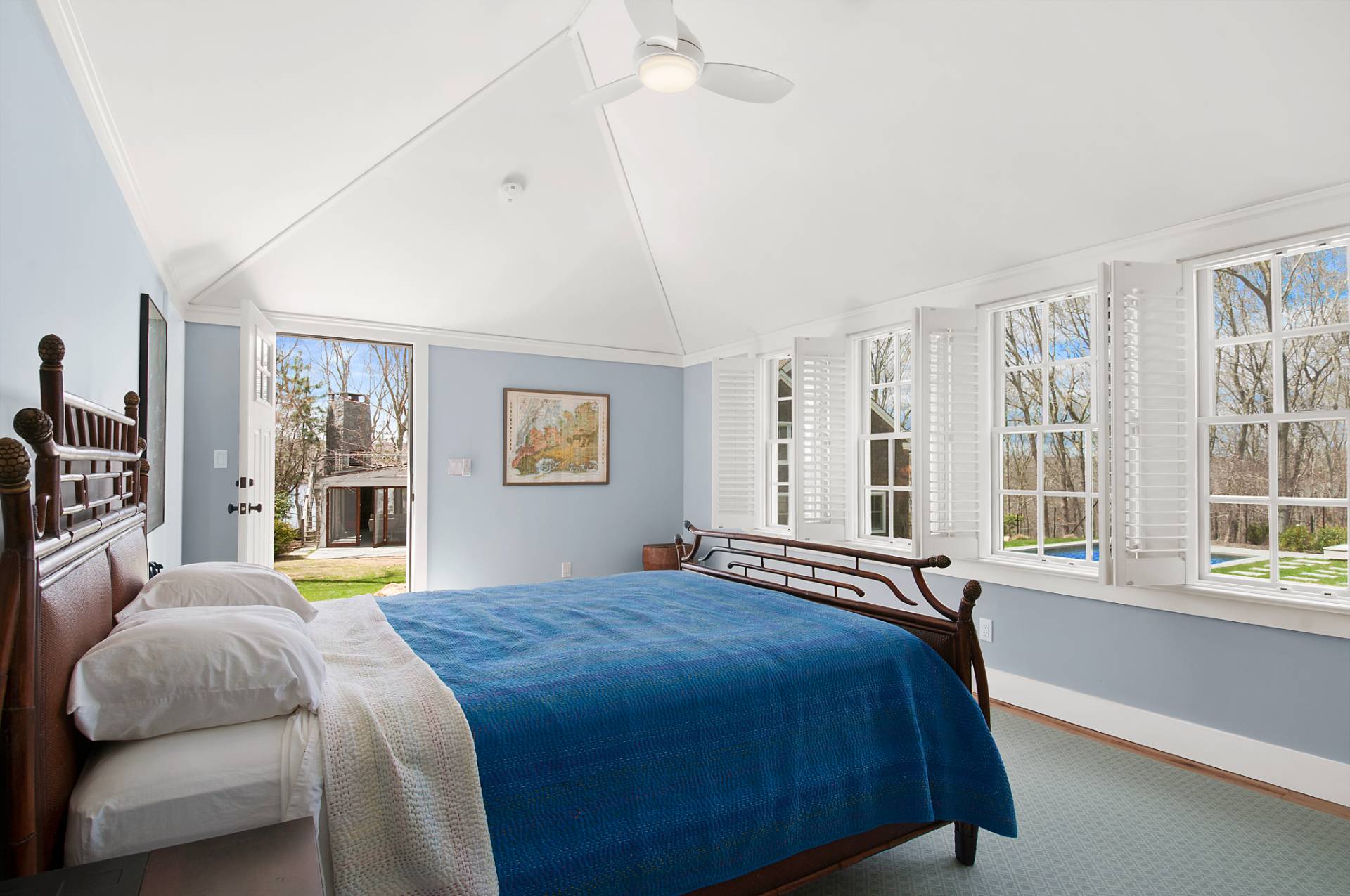 1333 Sagg Road Sag Harbor, NY 11963 - Photo 20 of 29 a bedroom with a large bed and a window
