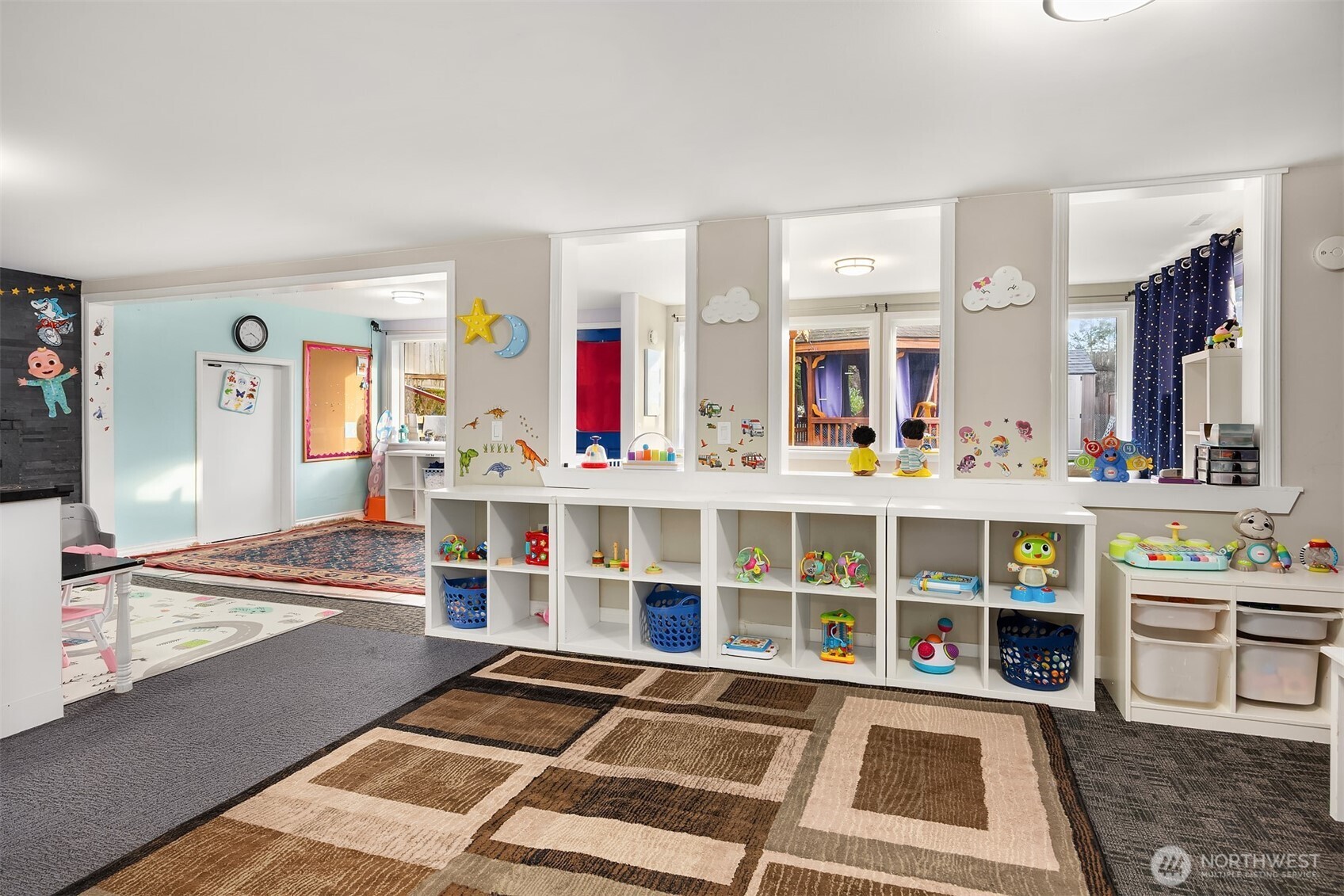 15411 Southeast 8th Street Bellevue, WA 98007 - Photo 15 of 24 a room with lots of white walls and a rug