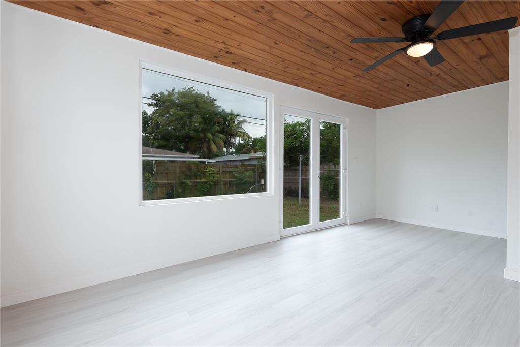 713 Southwest 4th Court Hallandale Beach, FL 33009 - Photo 29 of 38 a view of an empty room with a window