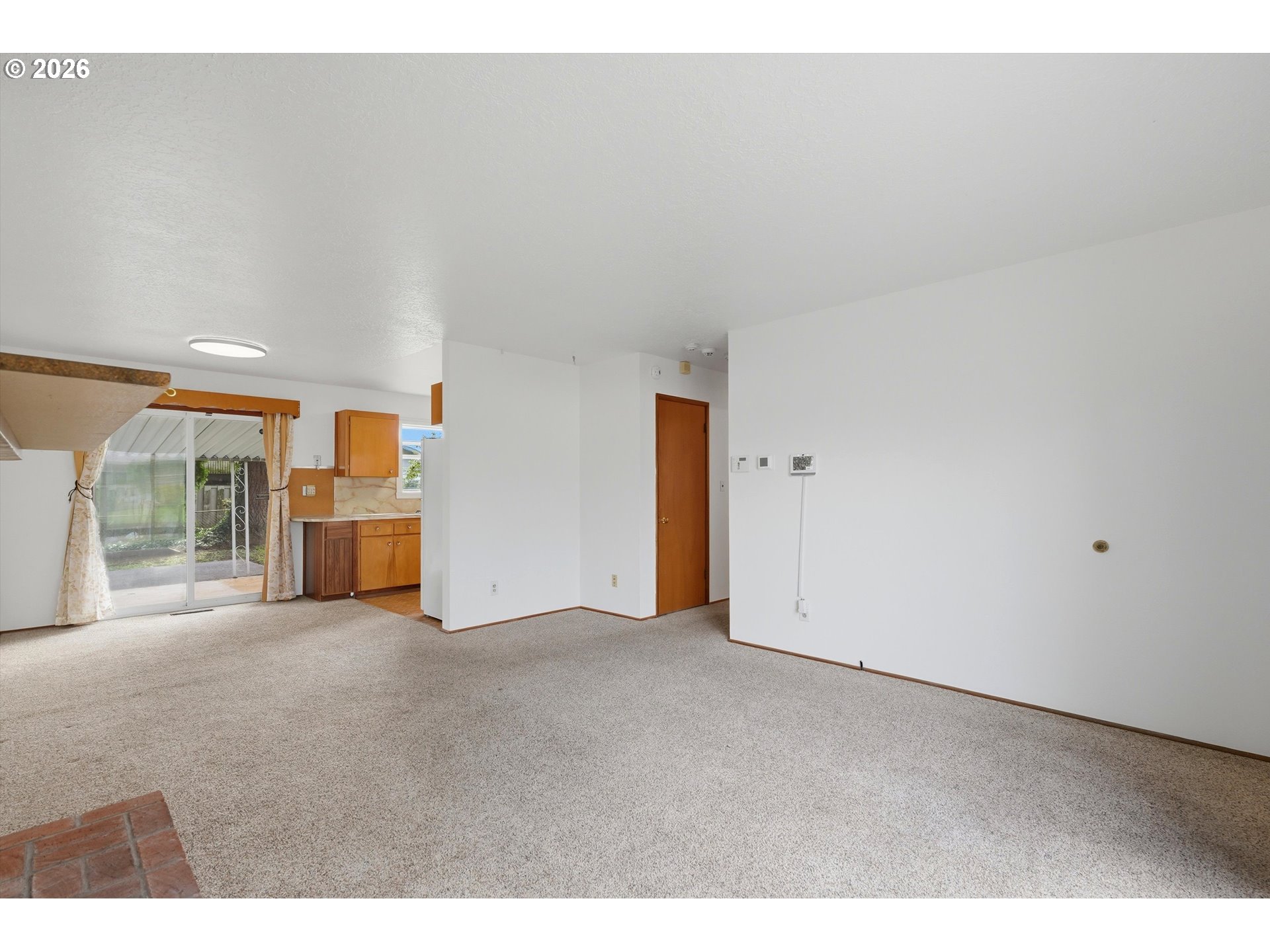 16706 Southeast Ankeny Street Portland, OR 97233 - Photo 11 of 43 a view of a big room with closet and windows