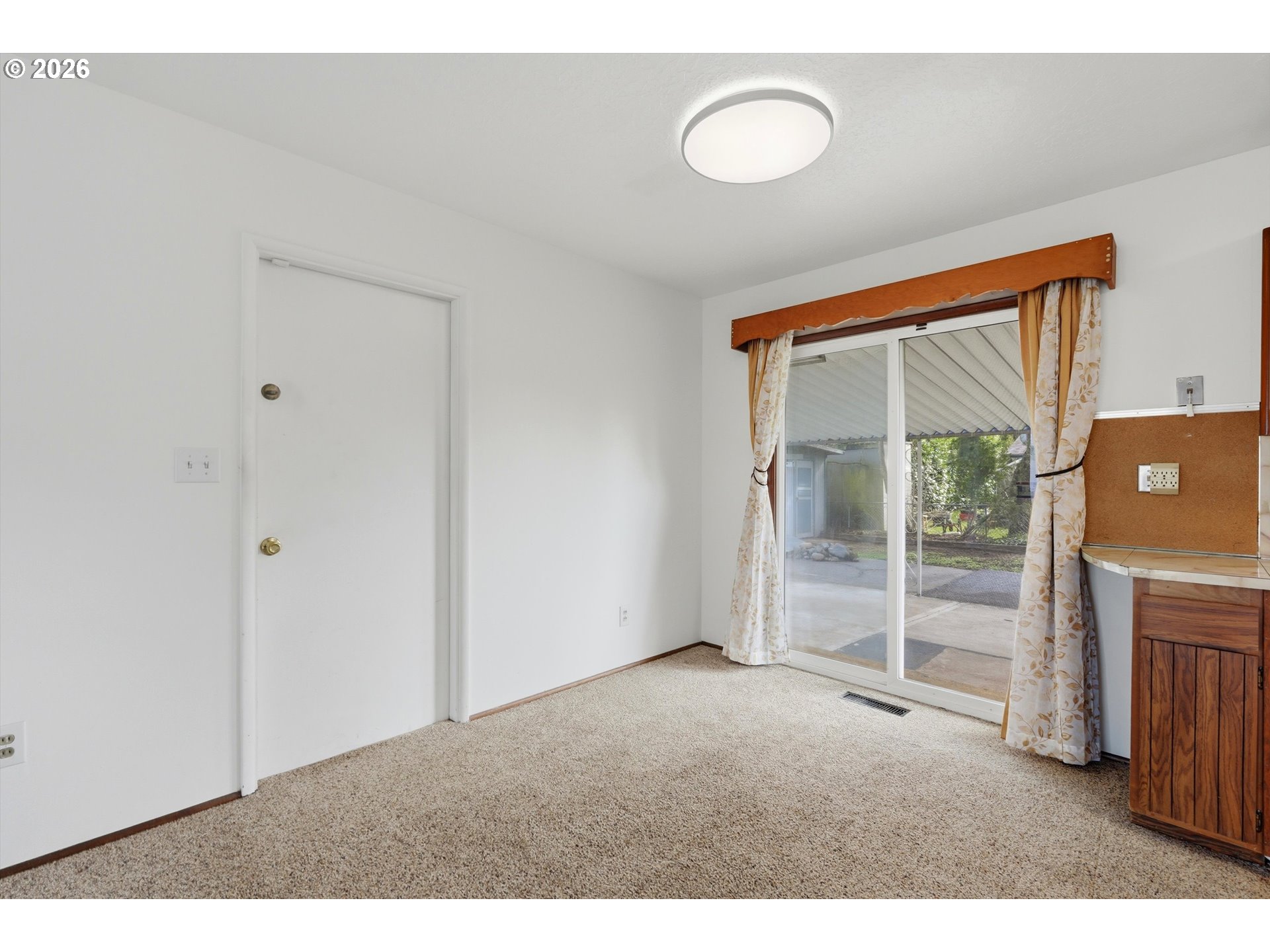 16706 Southeast Ankeny Street Portland, OR 97233 - Photo 12 of 43 a view of empty room with wooden floor