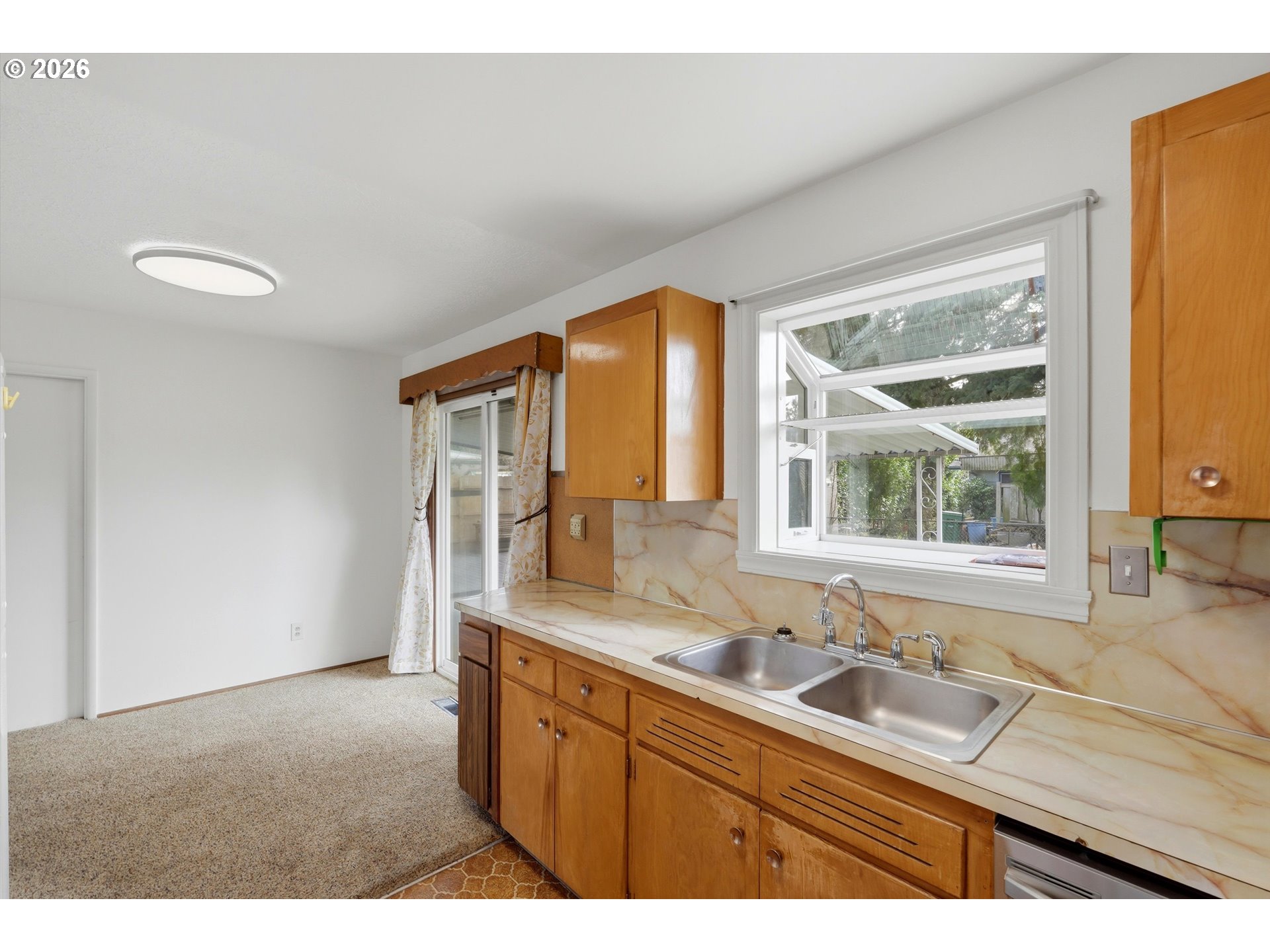 16706 Southeast Ankeny Street Portland, OR 97233 - Photo 15 of 43 a bathroom with a sink and a window