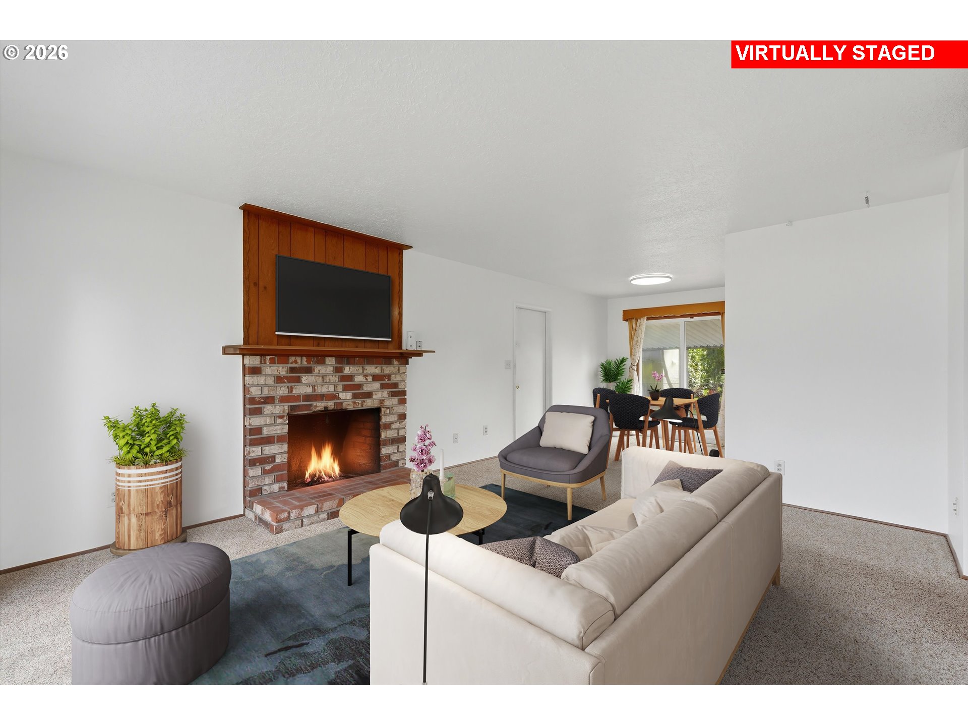 16706 Southeast Ankeny Street Portland, OR 97233 - Photo 8 of 43 a living room with furniture a fireplace and a flat screen tv