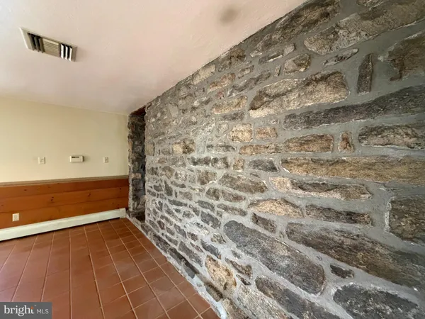 a view of a room with racks on the wall
