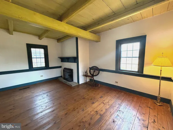 a living room with a rug