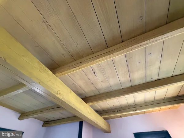 a view of room with wooden walls