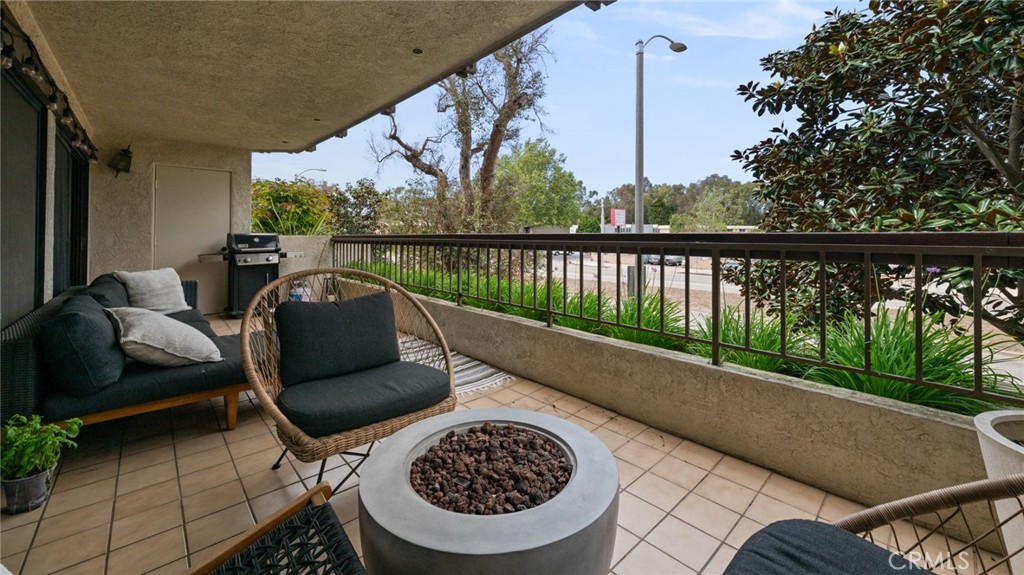 8512 Tuscany Avenue, Unit 222 Playa del Rey, CA 90293 - Photo 16 of 24 a view of a chairs and table in the balcony