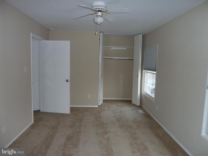 20 Ridgelawn Road, Unit B Reisterstown, MD 21136 - Photo 3 of 11 a view of an empty room with a window