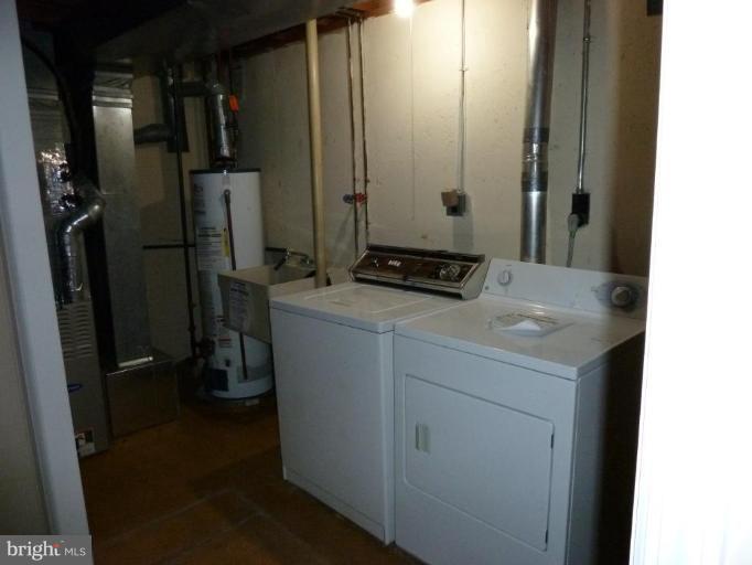 20 Ridgelawn Road, Unit B Reisterstown, MD 21136 - Photo 6 of 11 a room with storage and utility