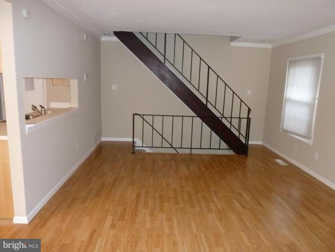 20 Ridgelawn Road, Unit B Reisterstown, MD 21136 - Photo 7 of 11 a view of an entryway with wooden floor