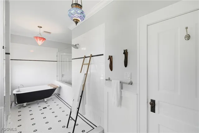 a bathroom with a shower and a sink