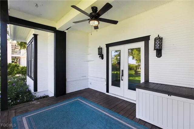 a view of livingroom with hardwood floor and a ceiling fan