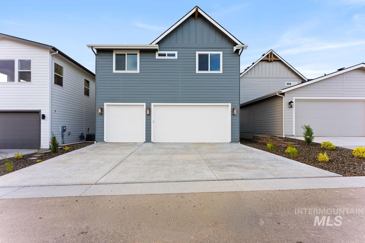 13338 North Spring Creek Way Boise, ID 83714 - Photo 35 of 46 Contemporary two-story residence featuring horizontal siding and a gable roofline