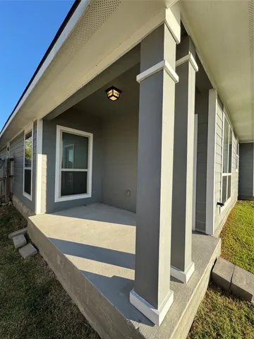 a bathroom with a tub and shower