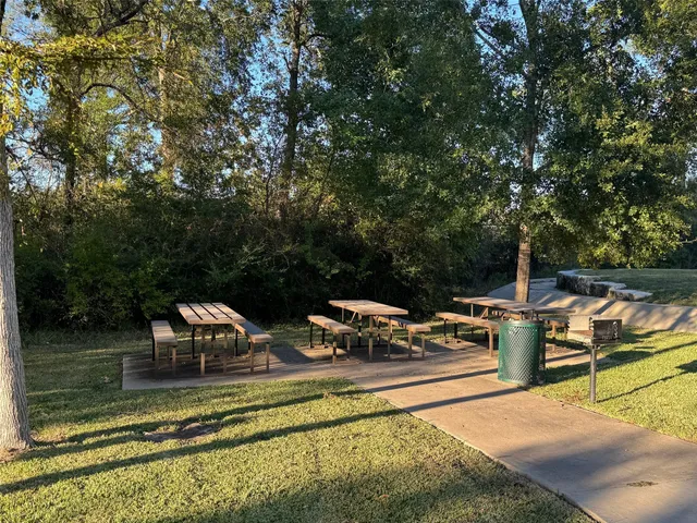 a view of a swimming pool with chairs