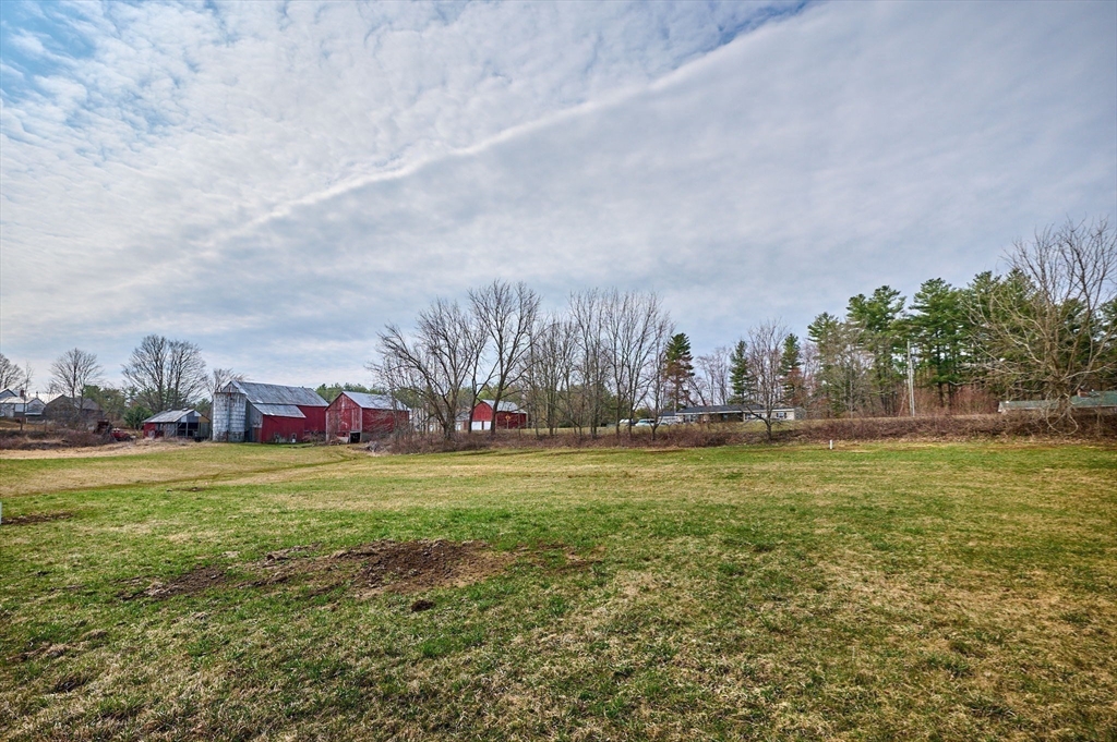 0 Glendale Road Southampton, MA 01073 - Photo 6 of 25 a view of a field with an trees in front of it