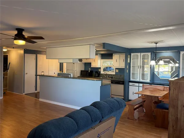 a kitchen with granite countertop lots of counter top space