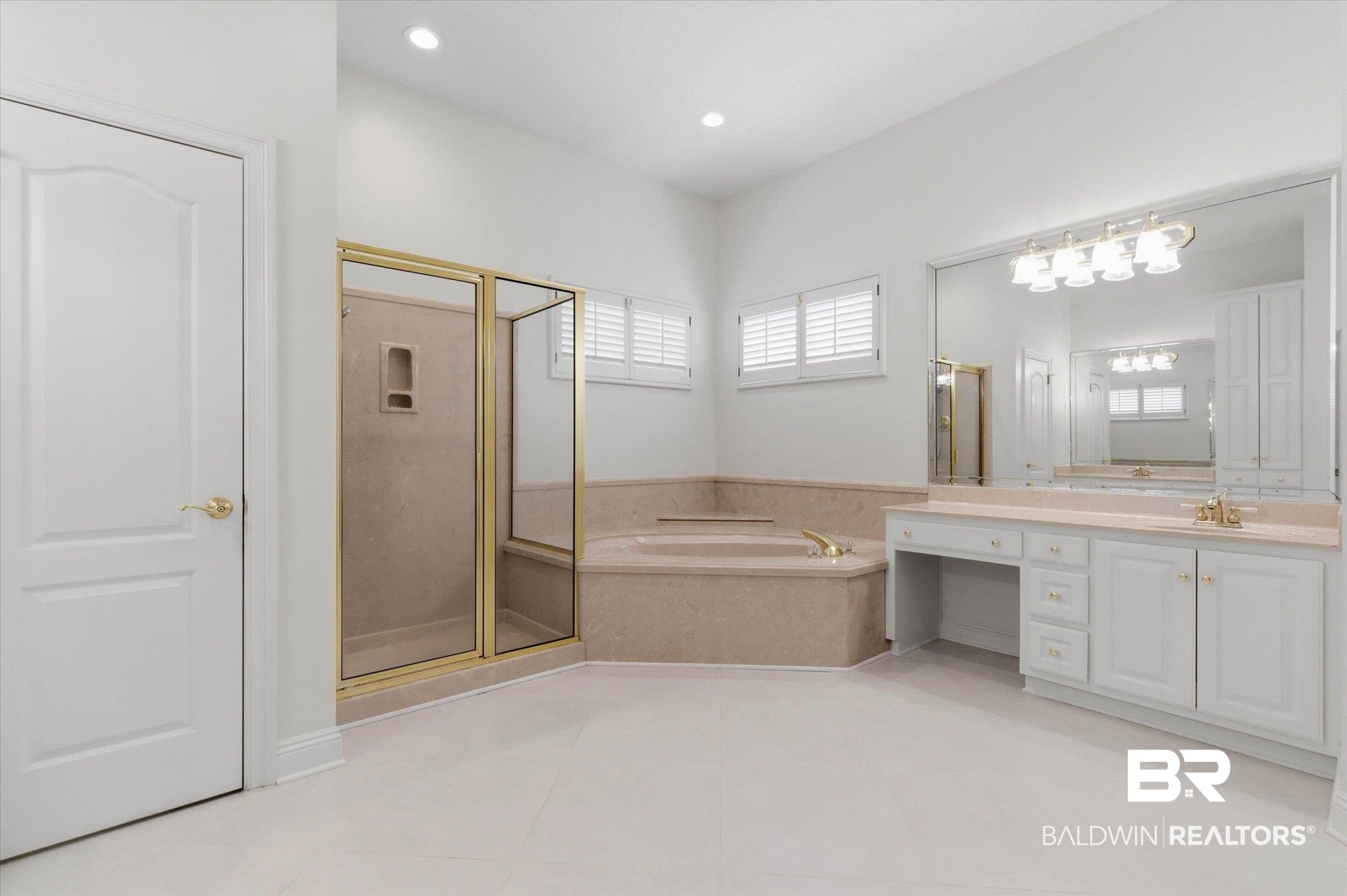 1083 Southern Way Court Mobile, AL 36609 - Photo 19 of 31 Bathroom with vanity, a shower stall, light tile patterned flooring, and a bath