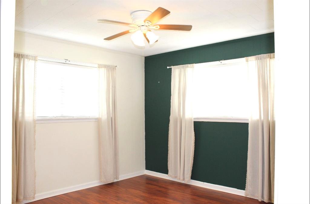 100 Hickory Road Lone Oak, TX 75453 - Photo 16 of 30 a view of a bedroom with a closet