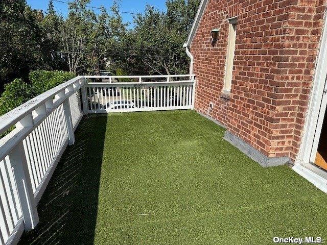 59 Radnor Road Great Neck, NY 11023 - Photo 10 of 15 a view of a balcony with wooden floor