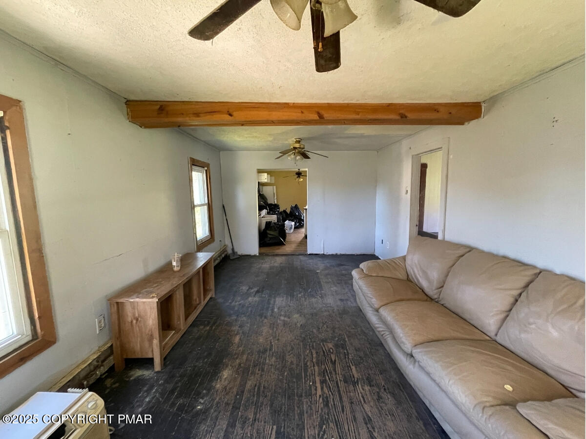 1900 Greenfield Road Jermyn, PA 18433 - Photo 30 of 86 a living room with furniture and a wooden floor