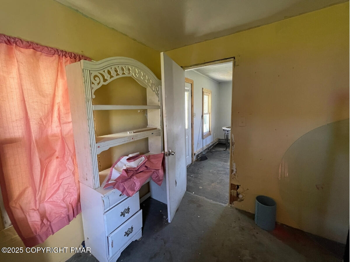 1900 Greenfield Road Jermyn, PA 18433 - Photo 43 of 86 a bedroom with a bed and a window