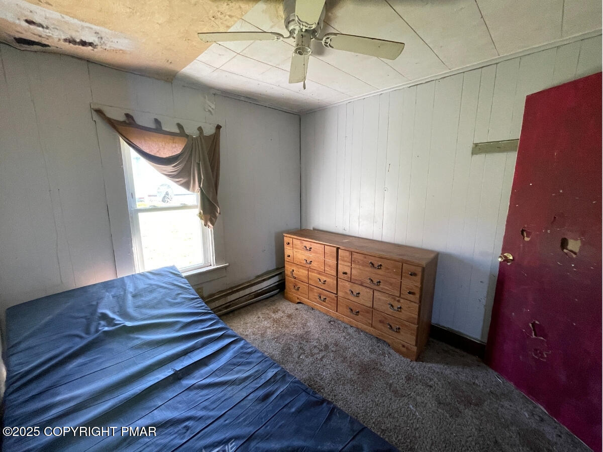 1900 Greenfield Road Jermyn, PA 18433 - Photo 46 of 86 a bedroom with a bed and a dresser