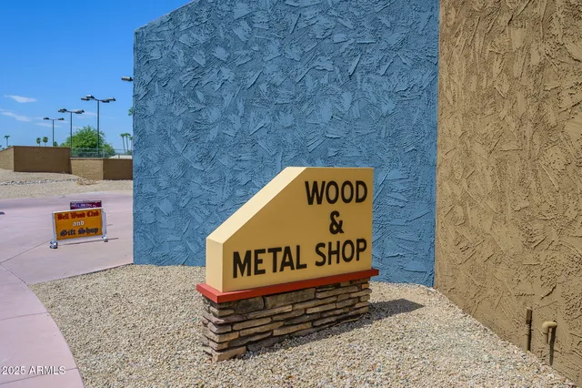 a view of a chairs and table in the patio