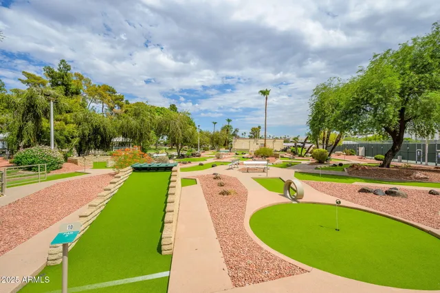 a view of a garden with a pathway