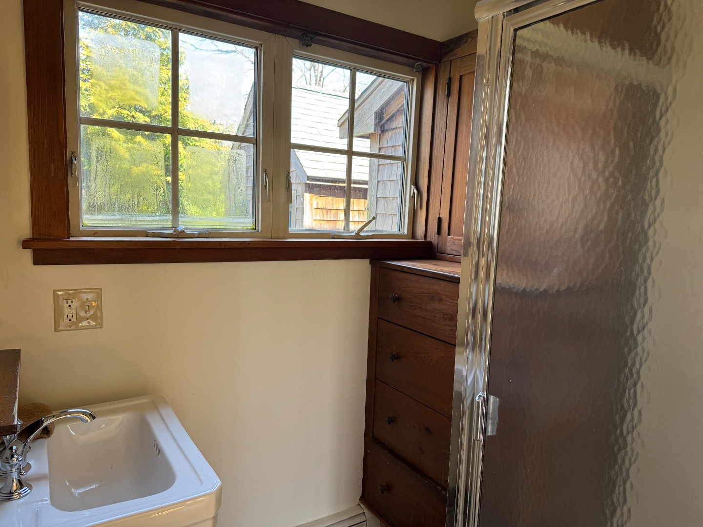 4 Rock Pond Road West Tisbury, MA 02568 - Photo 14 of 37 a bathroom with a sink and a window