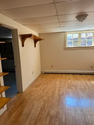 an empty room with closet area