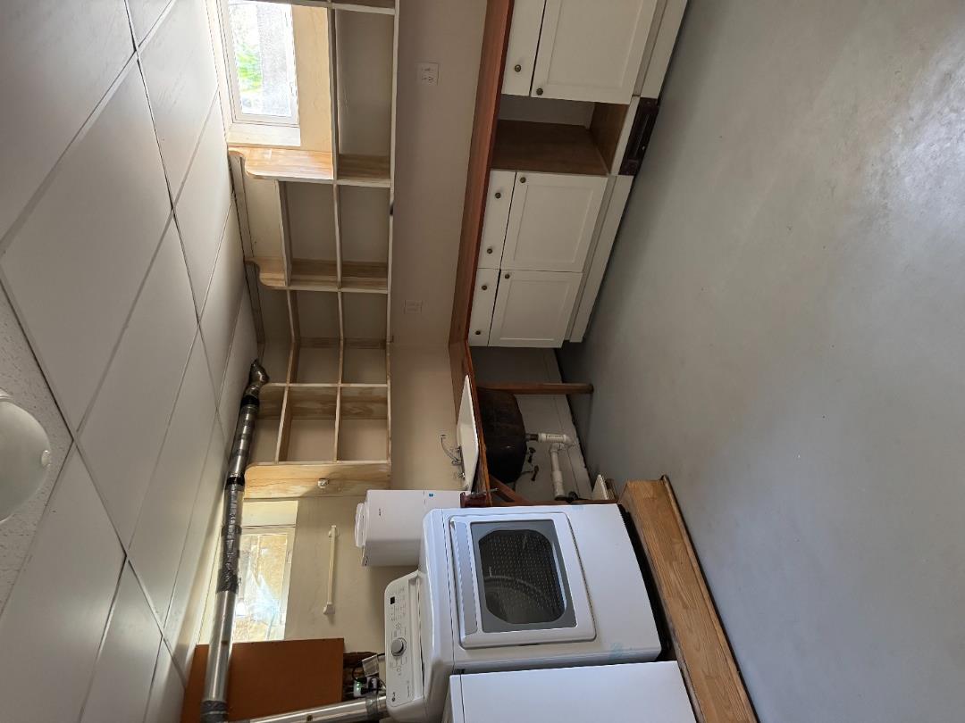 4 Rock Pond Road West Tisbury, MA 02568 - Photo 29 of 37 a kitchen with granite countertop a stove and a sink