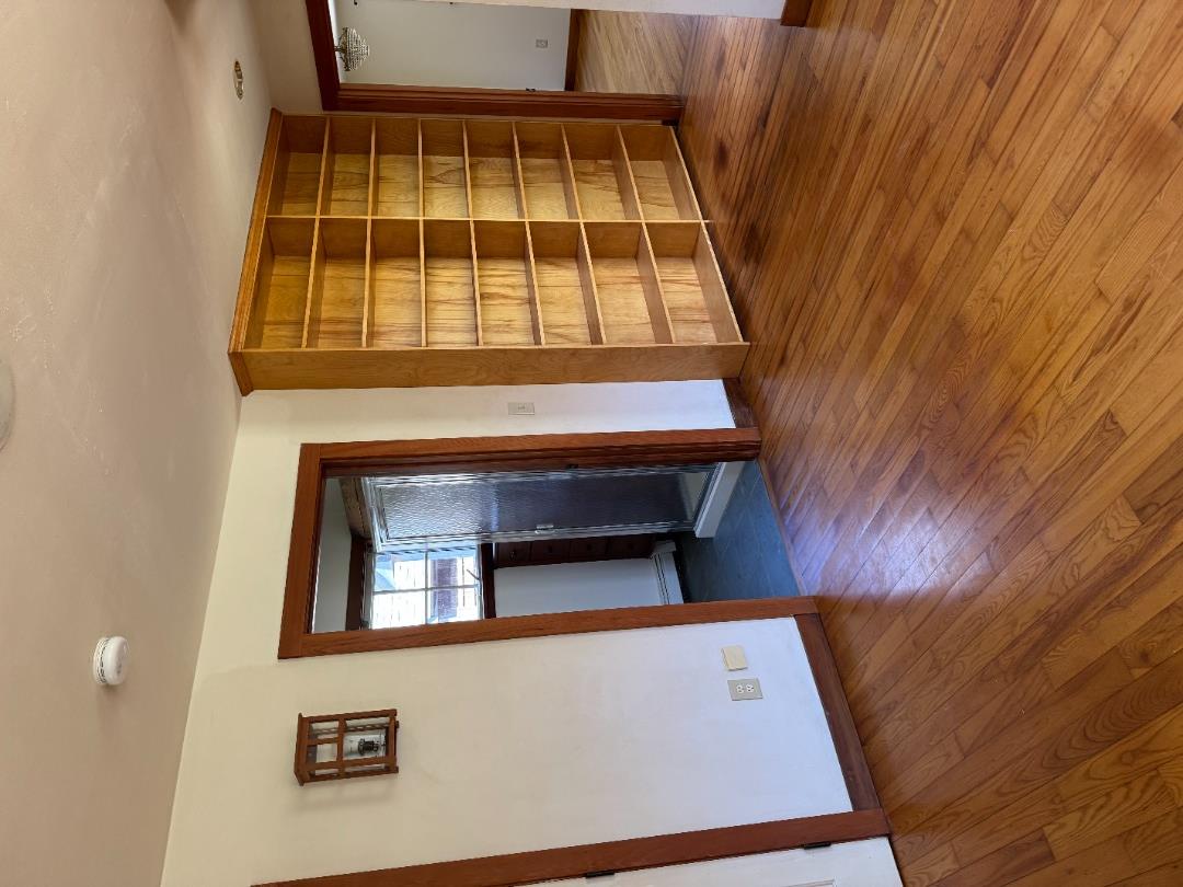 4 Rock Pond Road West Tisbury, MA 02568 - Photo 8 of 37 an empty room with wooden floor and closet